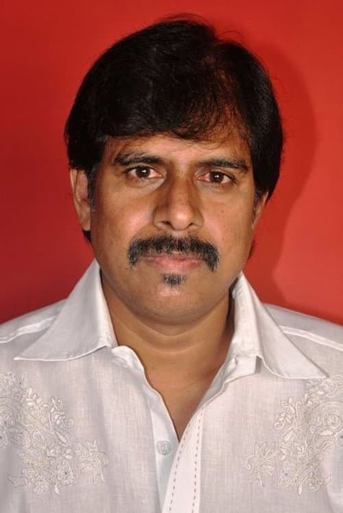 R K Selvamani image